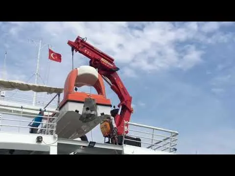Official video thumbnail showing a hydraulic marine deck crane