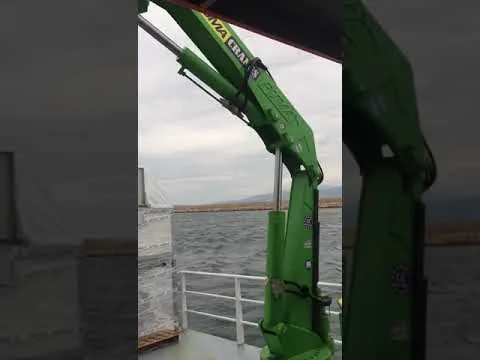 Official video thumbnail showing a knuckle-boom marine crane