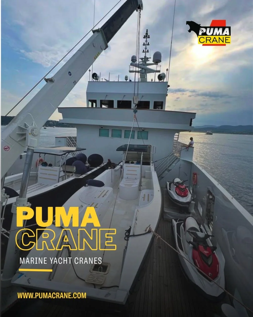 Marine crane positioned for yacht-tender handling