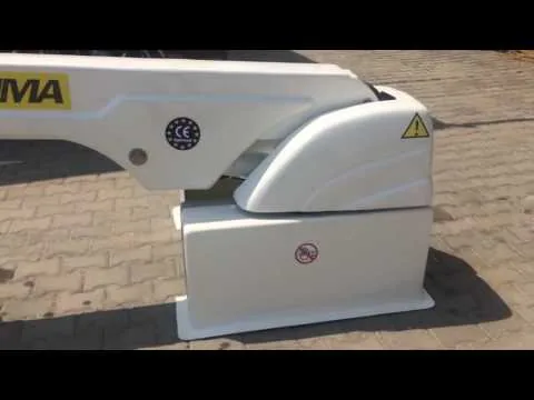 Official video thumbnail showing a hydraulic crane on a motor yacht