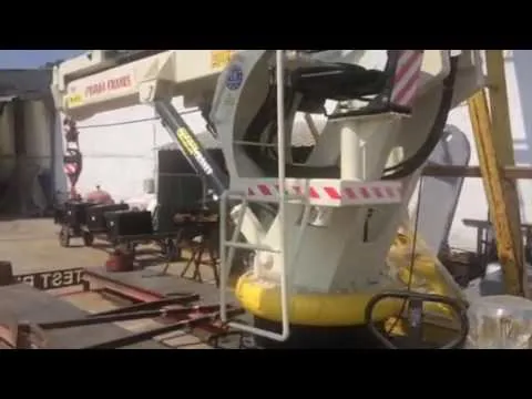 Official video thumbnail showing a telescopic-boom marine crane