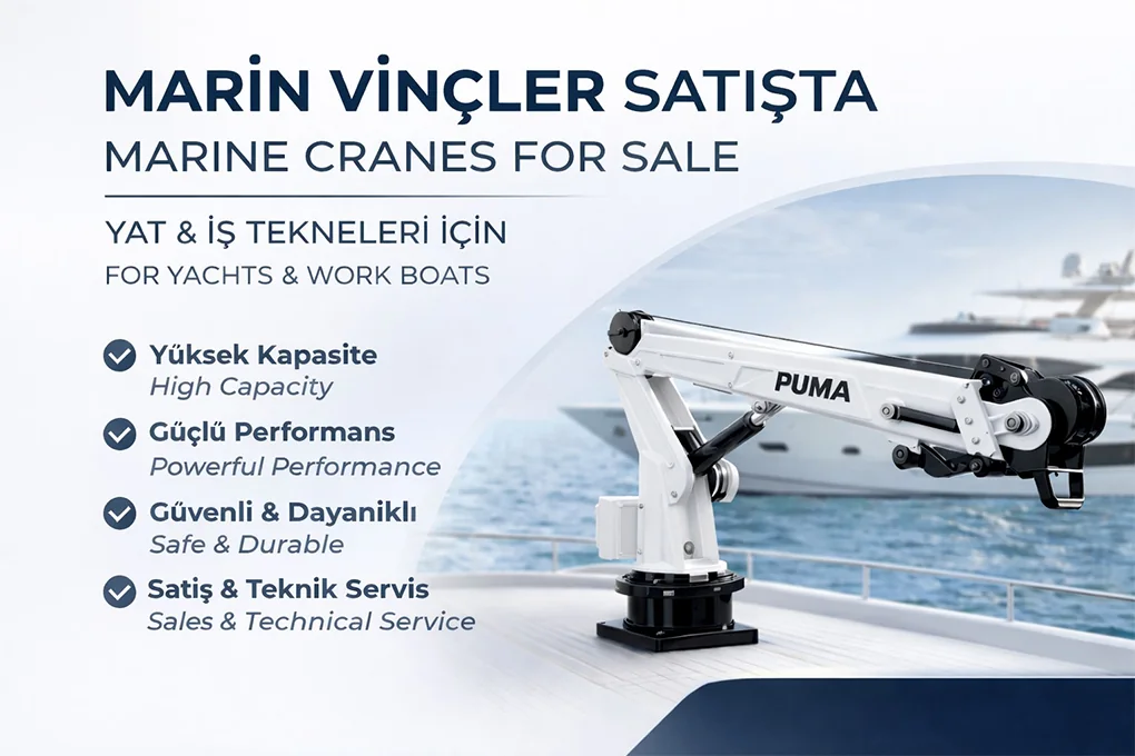 White hydraulic marine deck crane installed on a yacht or workboat